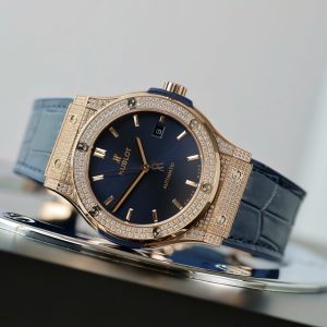 Đồng Hồ Hublot Replica Cao Cấp Classic Fusion King Gold Mặt Xanh Dương Đính Đá Xưởng HB 42mm (2)