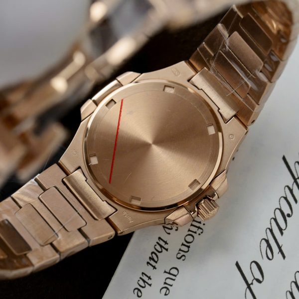 Đồng Hồ Patek Philippe Chế Tác Nautilus 7010R Nữ Mặt Tím Hồng Dây Kim Loại Xưởng GR 32mm (1)